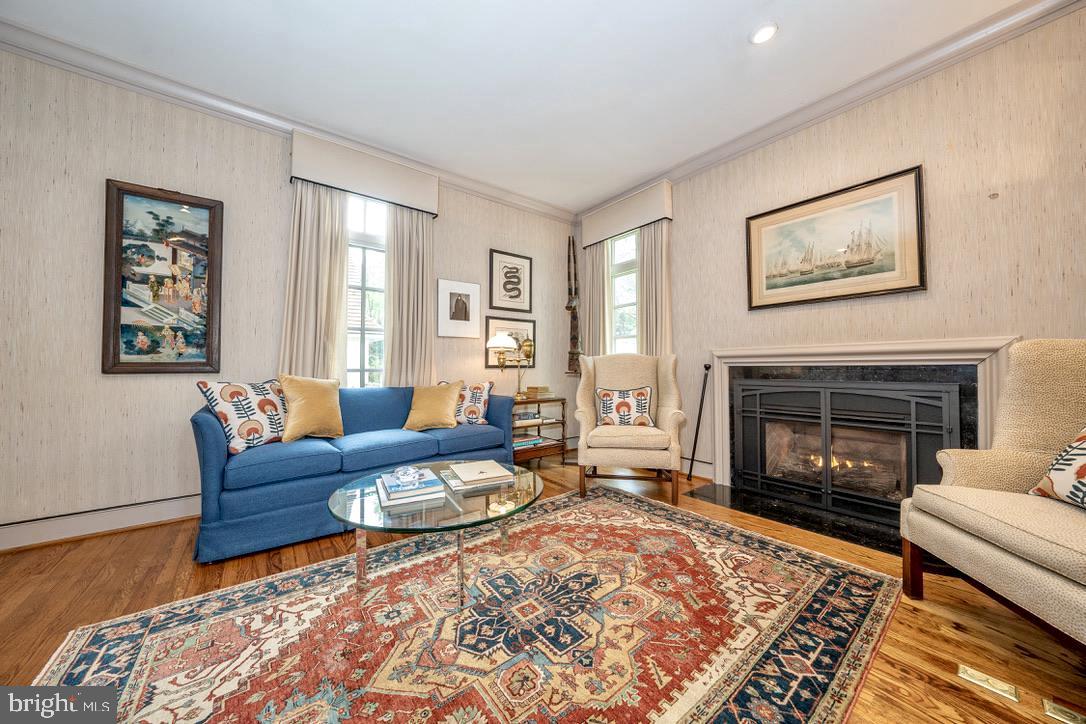 1201 Denbigh Lane Wayne, PA 19087 - Photo 23 of 54 a living room with furniture and a fireplace