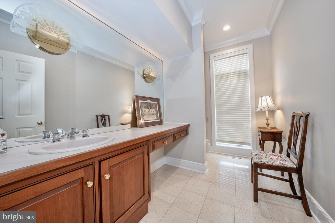 1201 Denbigh Lane Wayne, PA 19087 - Photo 25 of 54 a spacious bathroom with a sink and a mirror