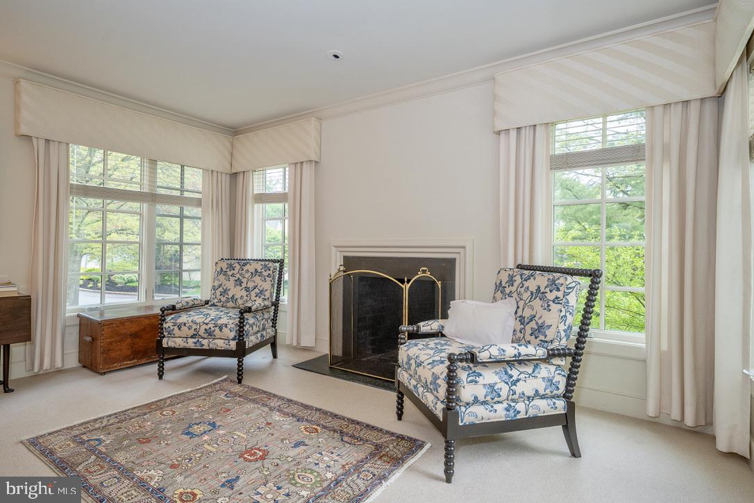 1201 Denbigh Lane Wayne, PA 19087 - Photo 31 of 54 a living room with furniture and a fireplace