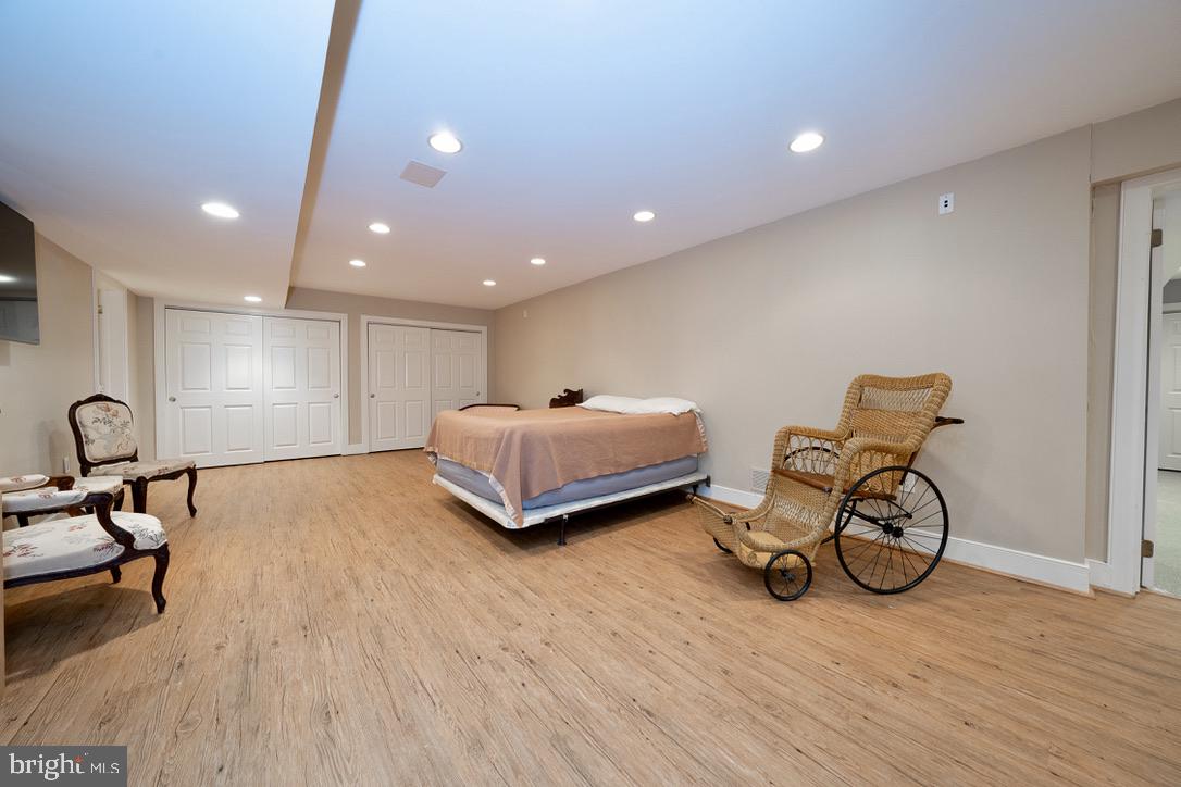 1201 Denbigh Lane Wayne, PA 19087 - Photo 40 of 54 a room with furniture and wooden floor