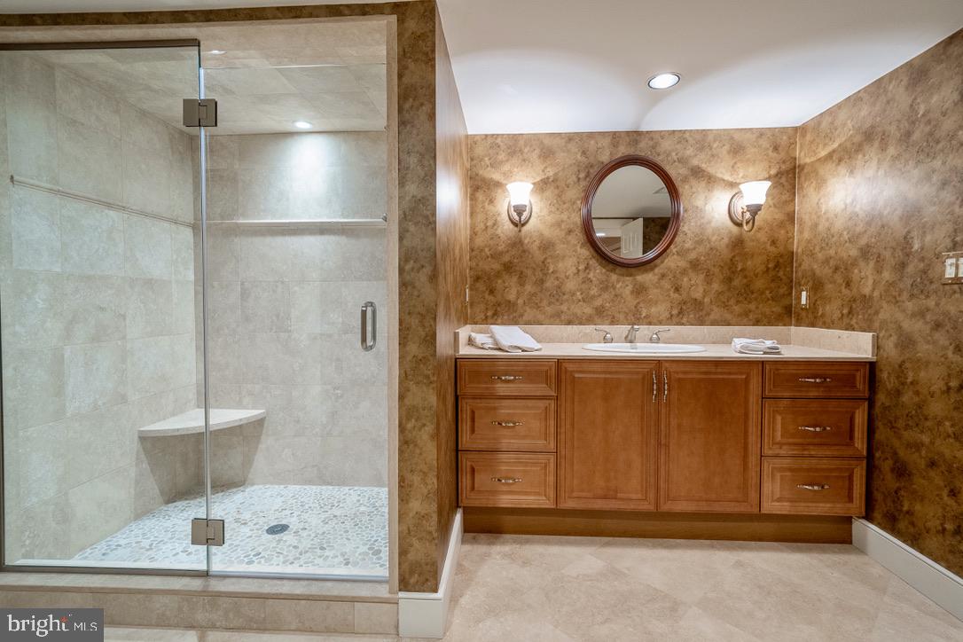 1201 Denbigh Lane Wayne, PA 19087 - Photo 44 of 54 a bathroom with a sink and a mirror