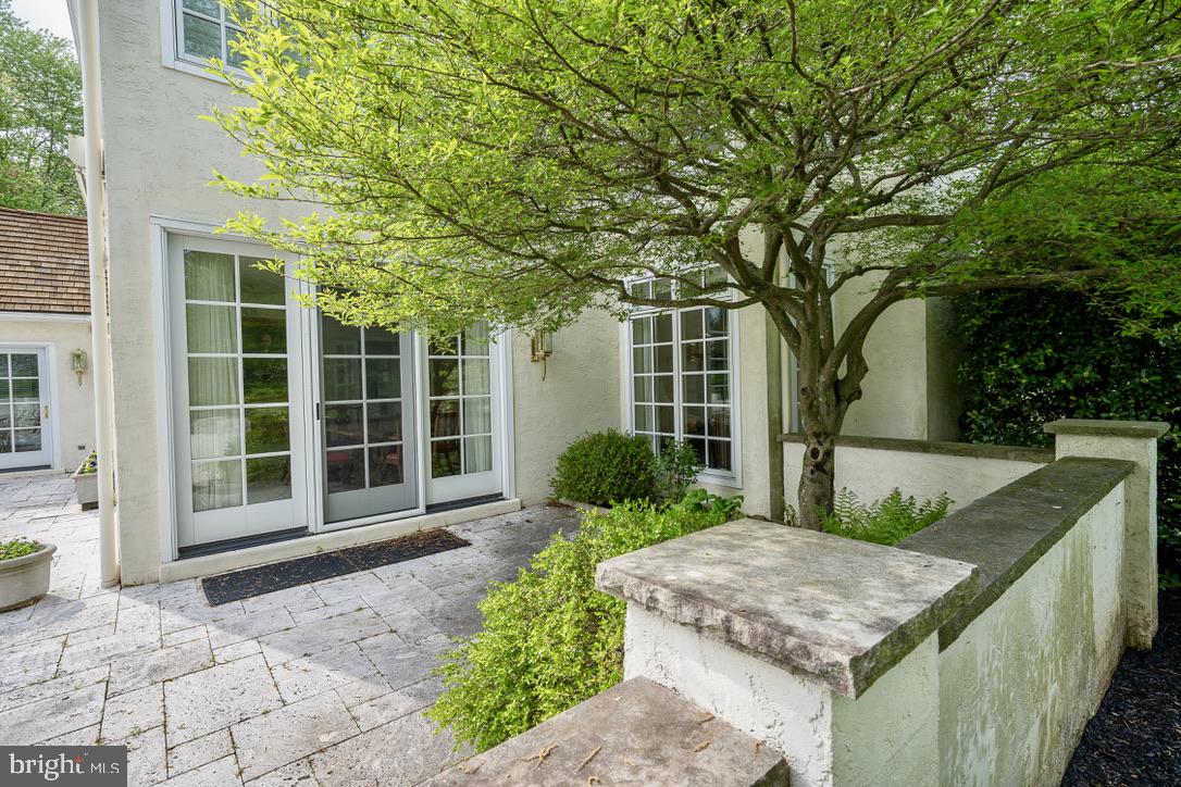 1201 Denbigh Lane Wayne, PA 19087 - Photo 49 of 54 a front view of a house with garden