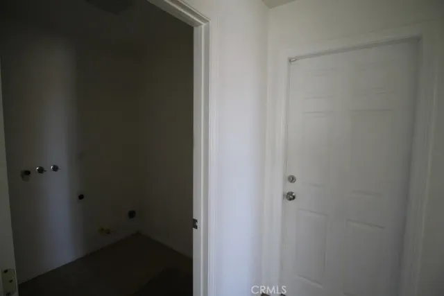 a kitchen that has a sink and a stove