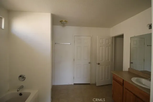 a bathroom with a sink and a tub