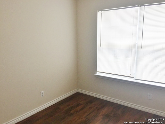 10003 Vasso View, Unit 2 Converse, TX 78109 - Photo 11 of 16 a view of a window in an empty room