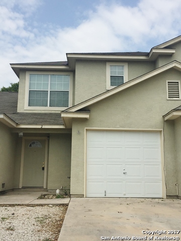 10003 Vasso View, Unit 2 Converse, TX 78109 - Photo 2 of 16 a view of a house with a wooden fence