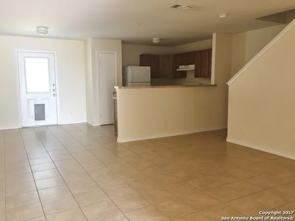 a view of a kitchen with a sink