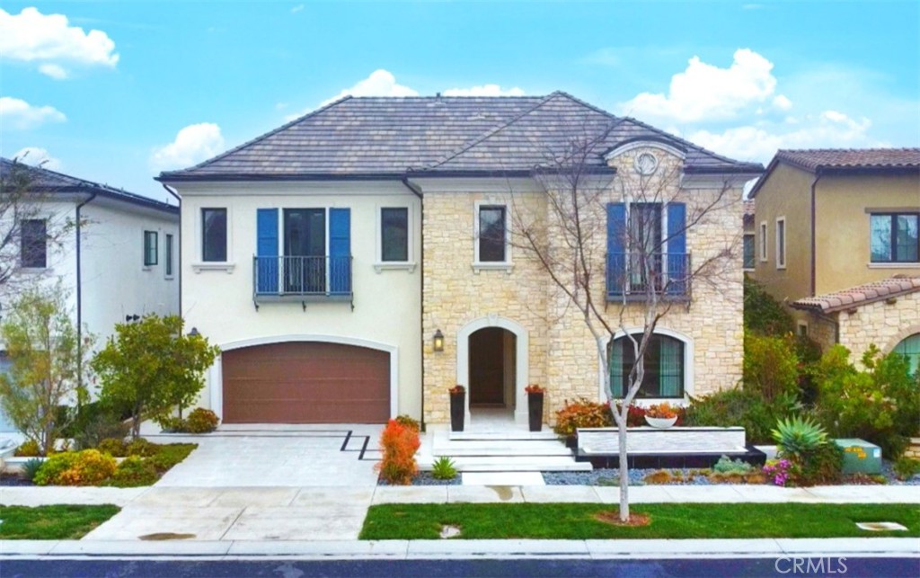 115 Interstellar Irvine, CA 92618 - Photo 1 of 36 a front view of house with yard and green space