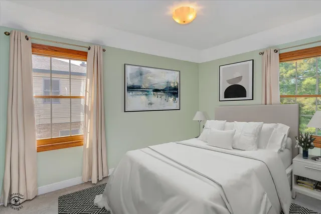 an empty room with window and wooden floor