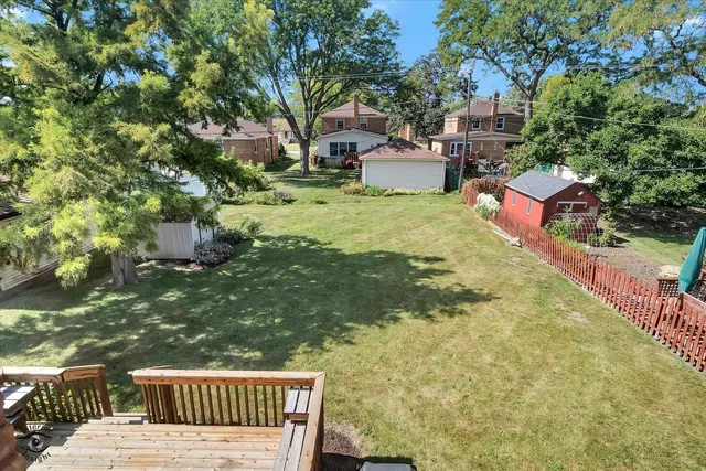 a view of a backyard with a garden