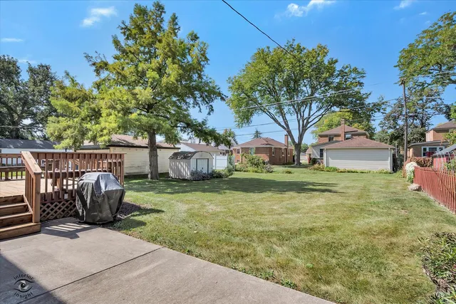 a view of balcony with deck and outdoor seating
