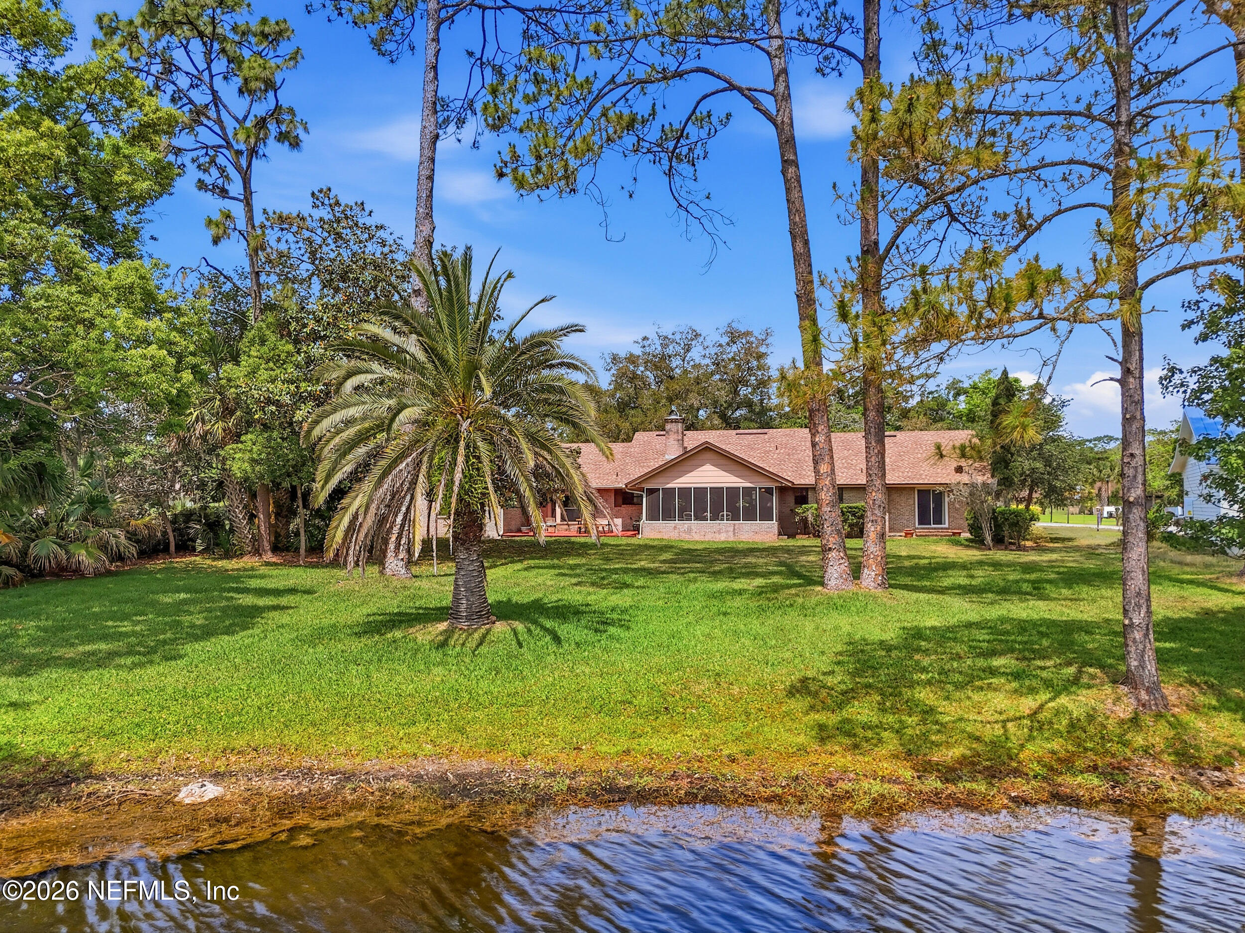 10702 Crosswicks Road Jacksonville, FL 32256 - Photo 46 of 82 Rear View of Home from Lake