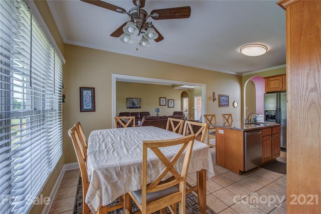 936 Ferguson Ridge Road Gastonia, NC 28052 - Photo 13 of 30 a view of a dining room with furniture