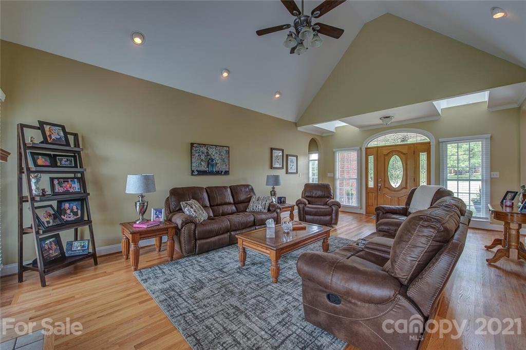 936 Ferguson Ridge Road Gastonia, NC 28052 - Photo 7 of 30 a living room with furniture and a wooden floor
