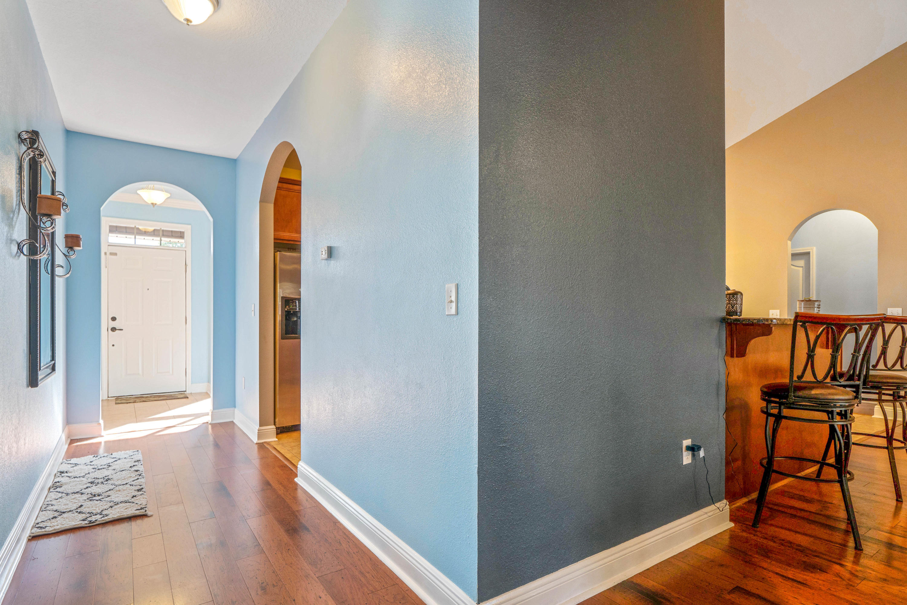627 Red Fern Road Crestview, FL 32536 - Photo 3 of 29 a view of a bedroom with wooden floor