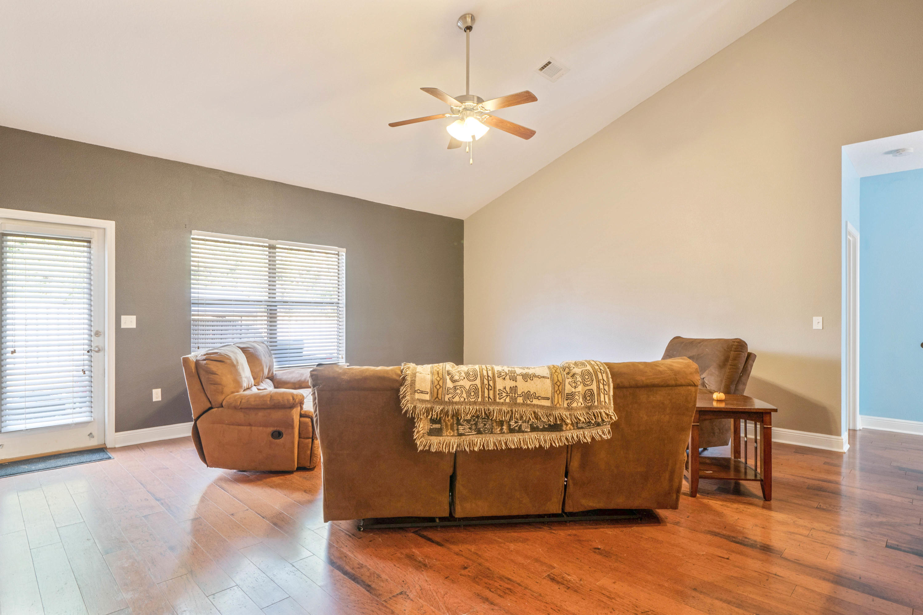 627 Red Fern Road Crestview, FL 32536 - Photo 10 of 29 a living room with furniture and wooden floor