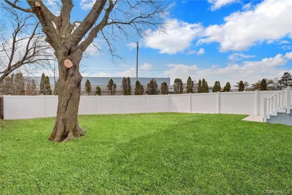 a view of backyard with green space