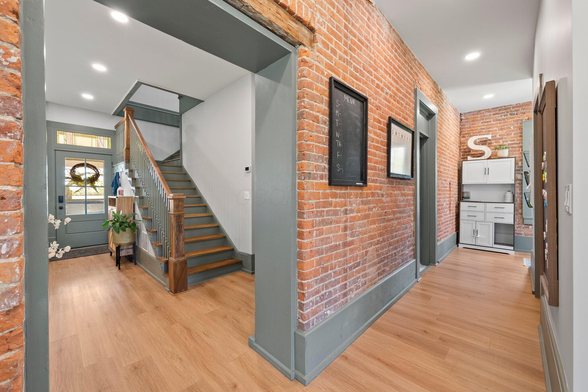 9214 Ashley Road Ashley, OH 43003 - Photo 11 of 77 Exposed Brick walls