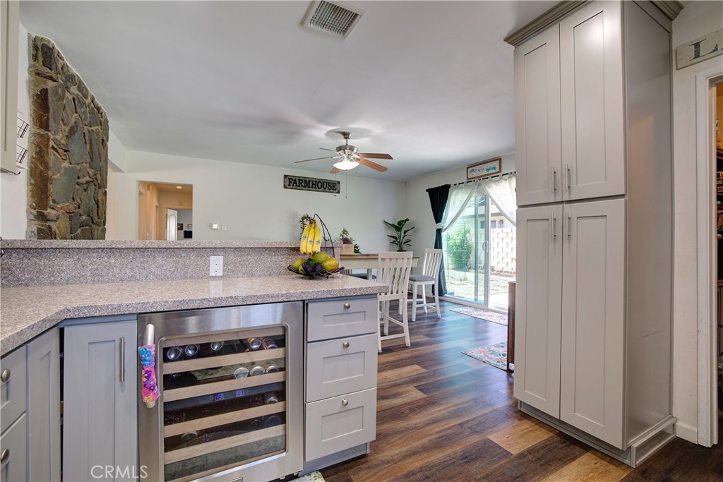 1140 North Belden Avenue Rialto, CA 92376 - Photo 11 of 37 a kitchen with a table and chairs