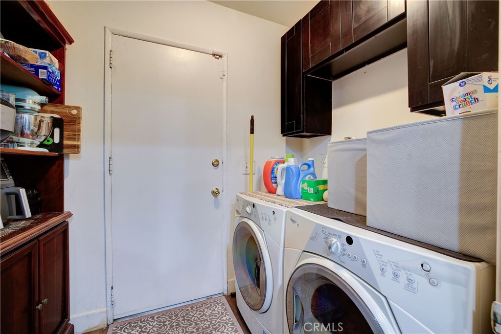 1140 North Belden Avenue Rialto, CA 92376 - Photo 12 of 37 a utility room with dryer and washer
