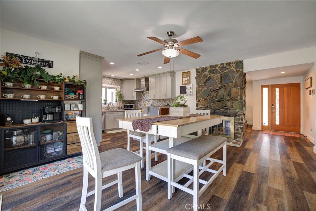 1140 North Belden Avenue Rialto, CA 92376 - Photo 14 of 37 a view of a dining room with furniture and wooden floor