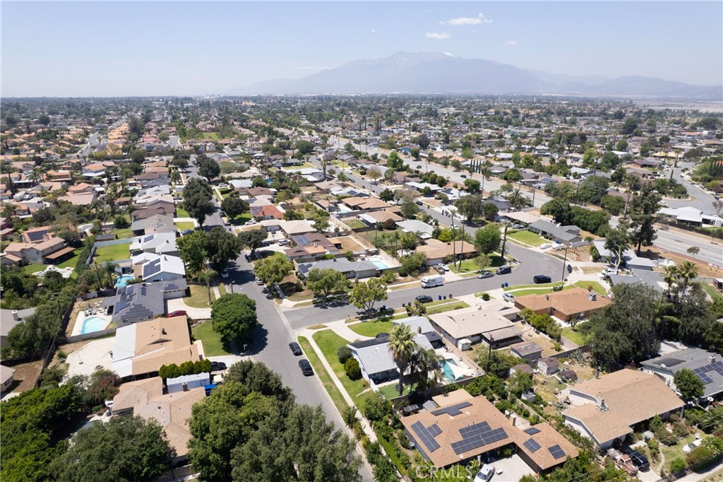 1140 North Belden Avenue Rialto, CA 92376 - Photo 36 of 37 an aerial view of a city with lots of residential buildings