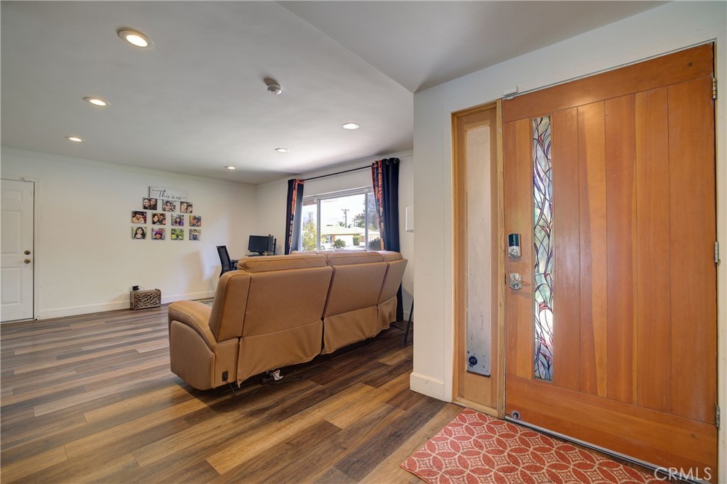 1140 North Belden Avenue Rialto, CA 92376 - Photo 5 of 37 a living room with furniture and a window
