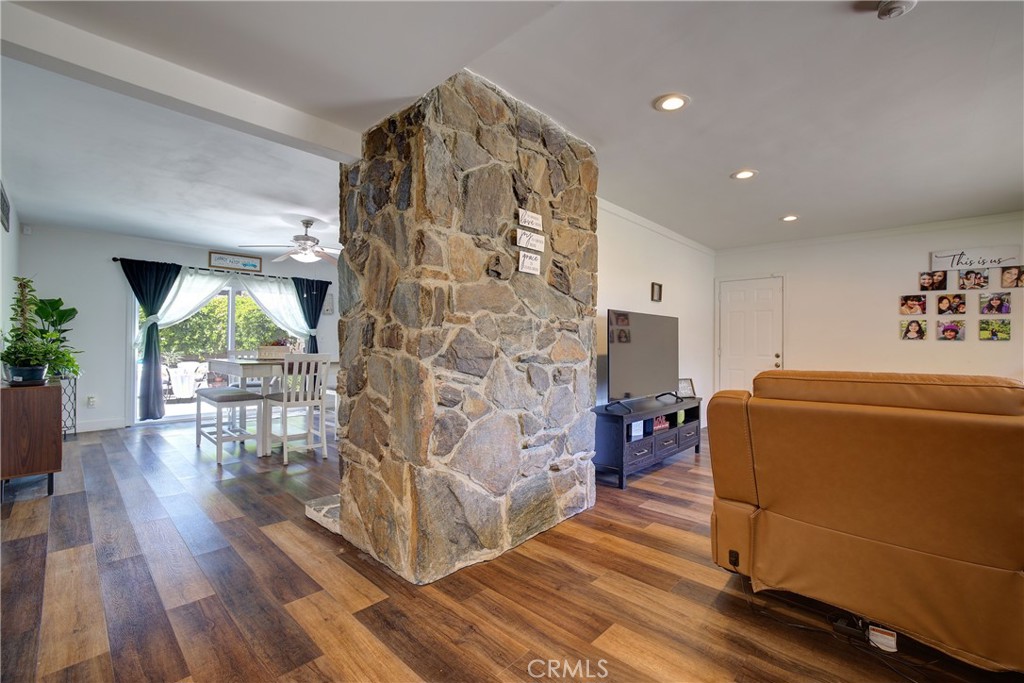 1140 North Belden Avenue Rialto, CA 92376 - Photo 6 of 37 a living room with furniture and a wooden floor