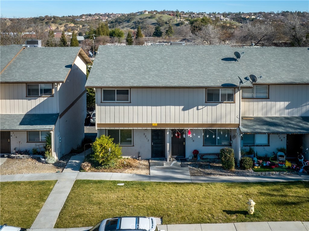 a view of house with a swimming pool