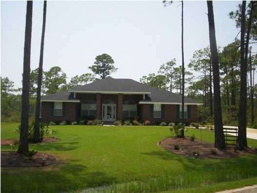 Lot I-1 Driftwood Point Road Santa Rosa Beach, FL 32459 - Photo 5 of 5 a front view of house with yard and green space