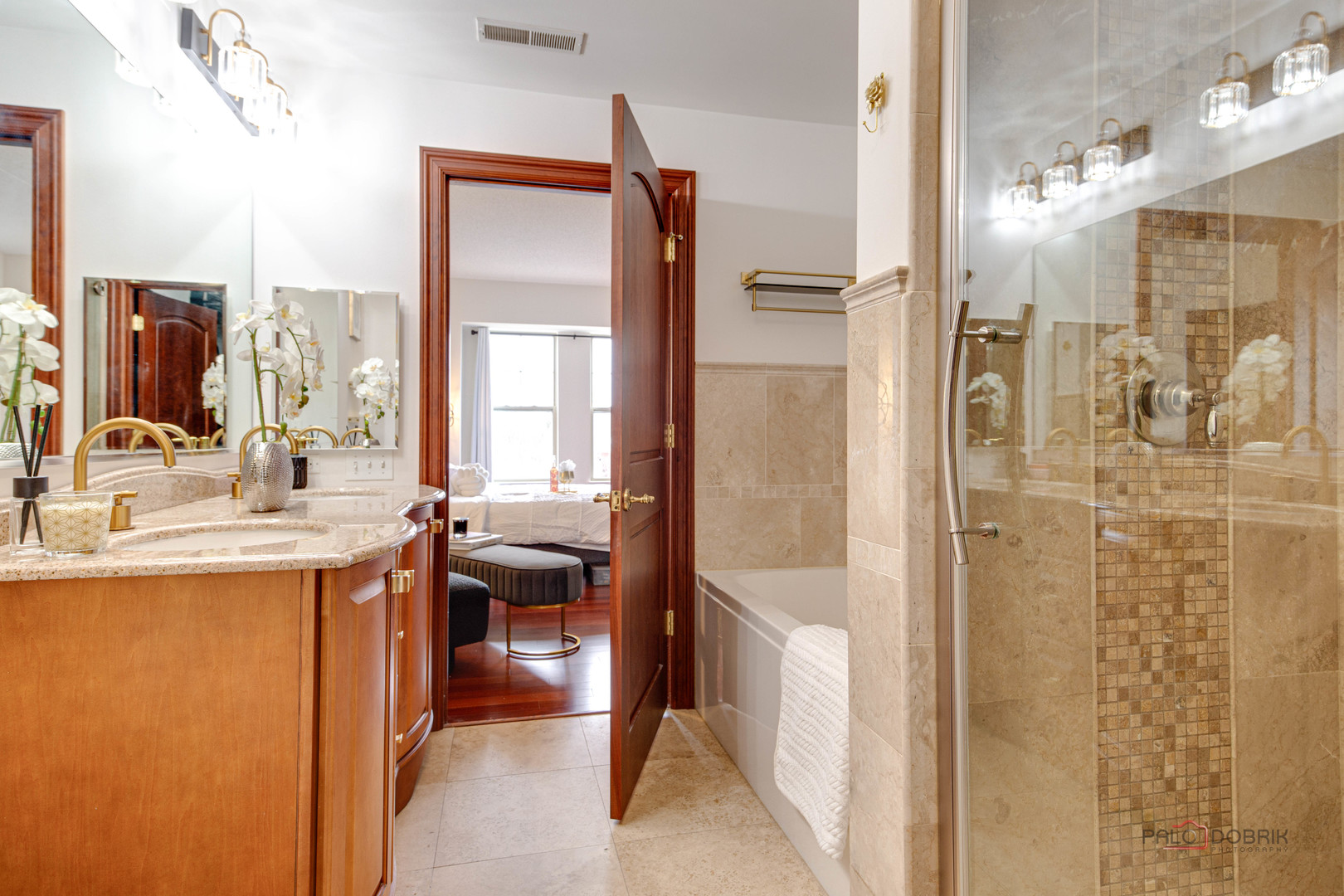 720 Prestwick Lane, Unit 302 Wheeling, IL 60090 - Photo 15 of 23 a view of a bathroom with a tub and a sink