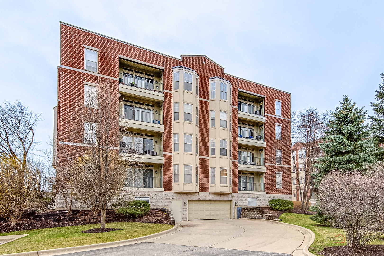 720 Prestwick Lane, Unit 302 Wheeling, IL 60090 - Photo 20 of 23 a front view of a building