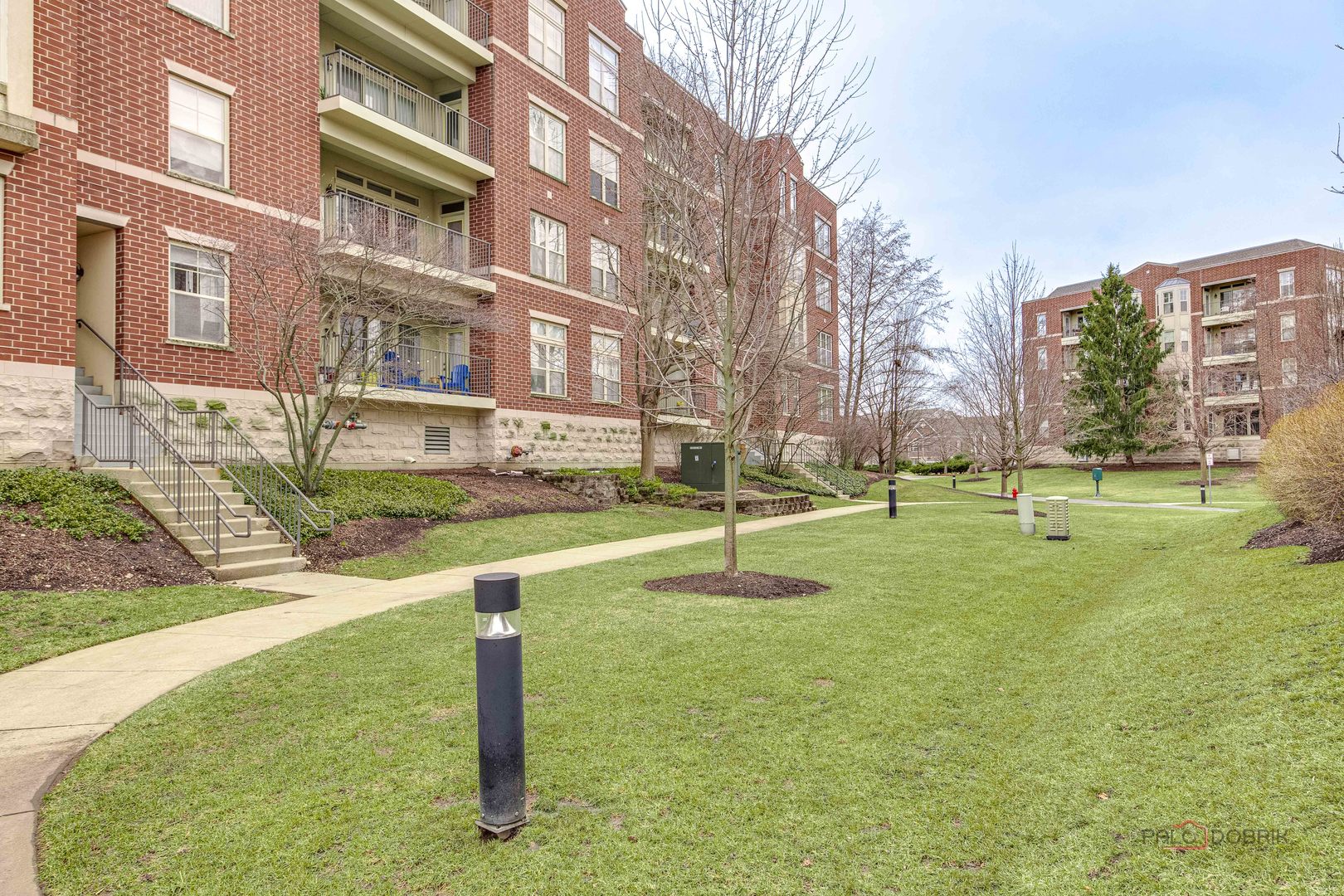 720 Prestwick Lane, Unit 302 Wheeling, IL 60090 - Photo 21 of 23 a view of a playground with basketball court