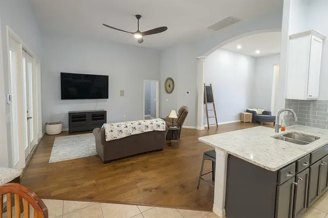 a dining room with furniture and window