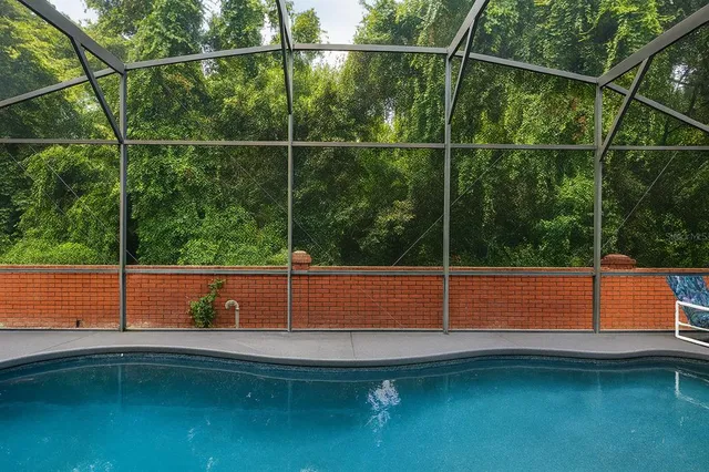 a view of a yard with a lake view