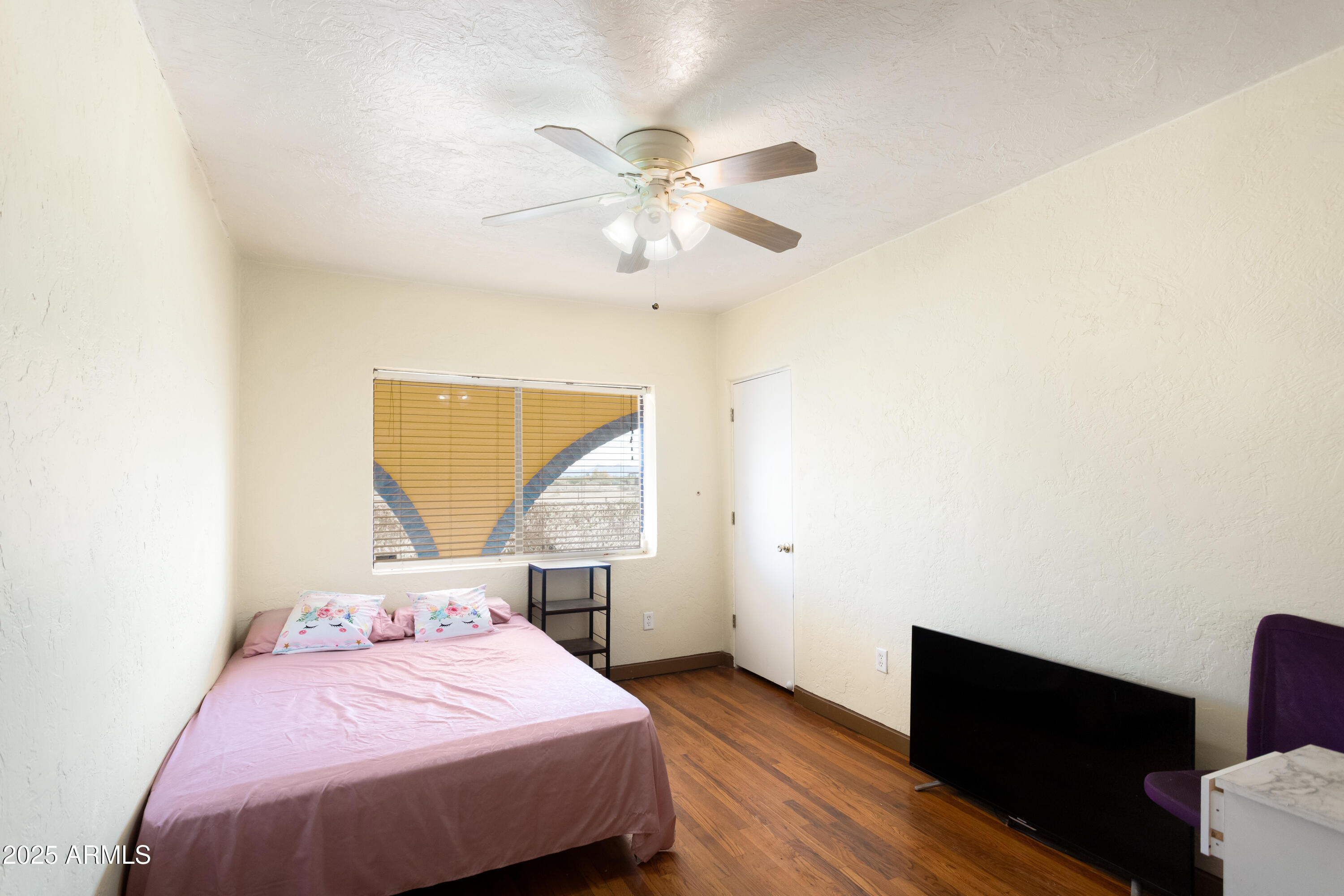 4181 West Double Adobe Road McNeal, AZ 85617 - Photo 16 of 41 a bedroom with a bed and a window