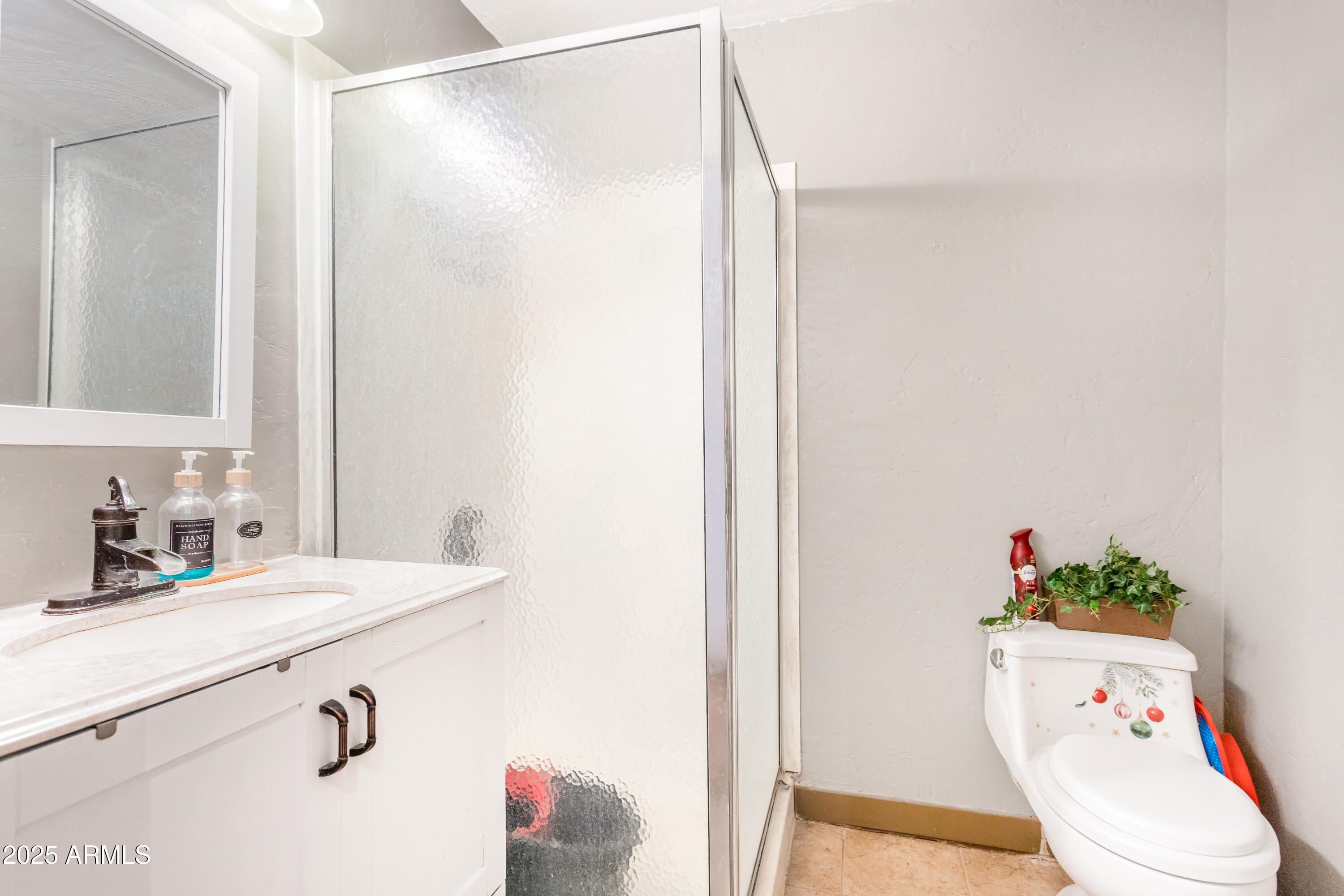 4181 West Double Adobe Road McNeal, AZ 85617 - Photo 18 of 41 a bathroom with a sink and a mirror