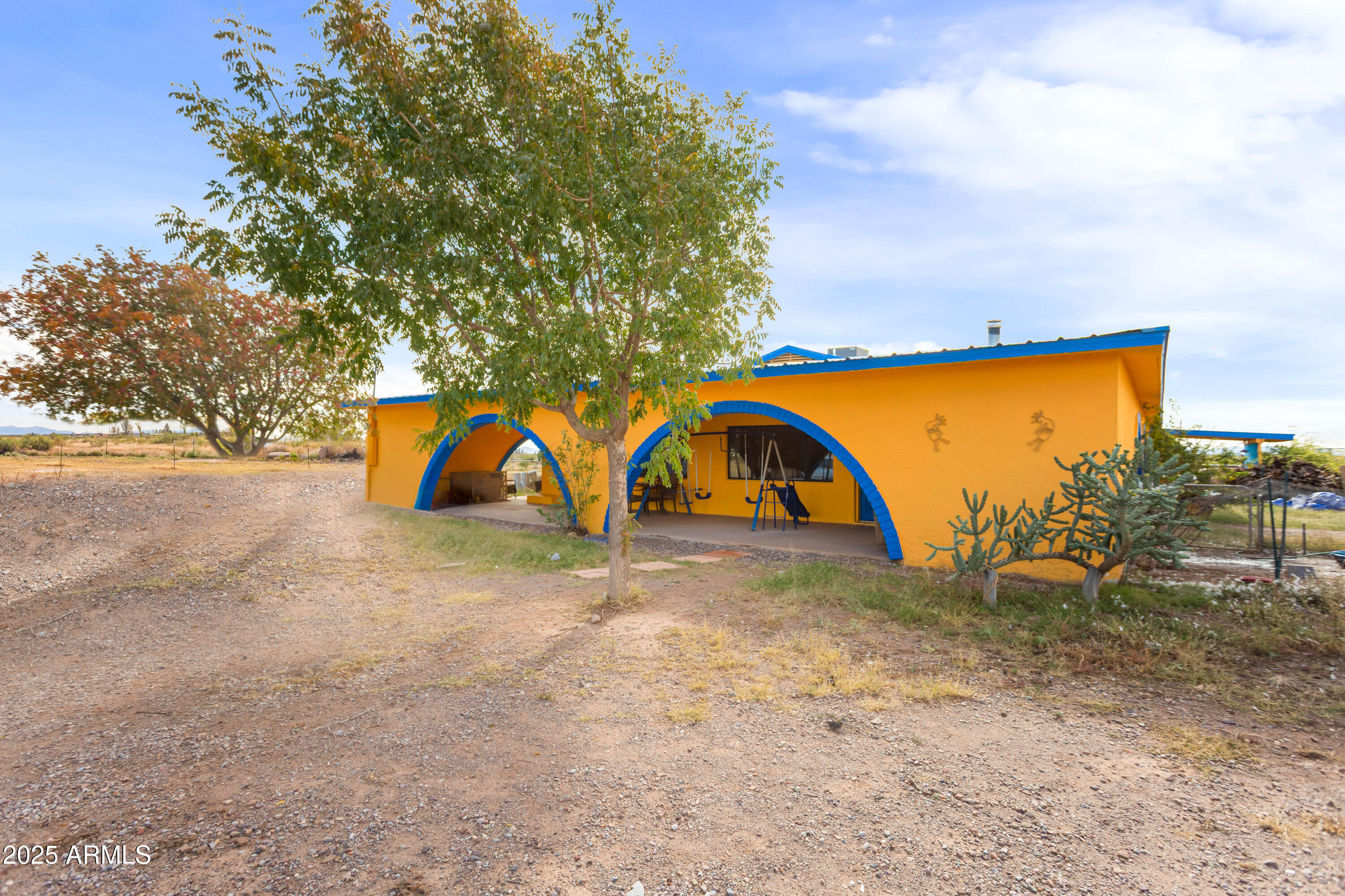 4181 West Double Adobe Road McNeal, AZ 85617 - Photo 2 of 41 a view of outdoor space with playground and green space
