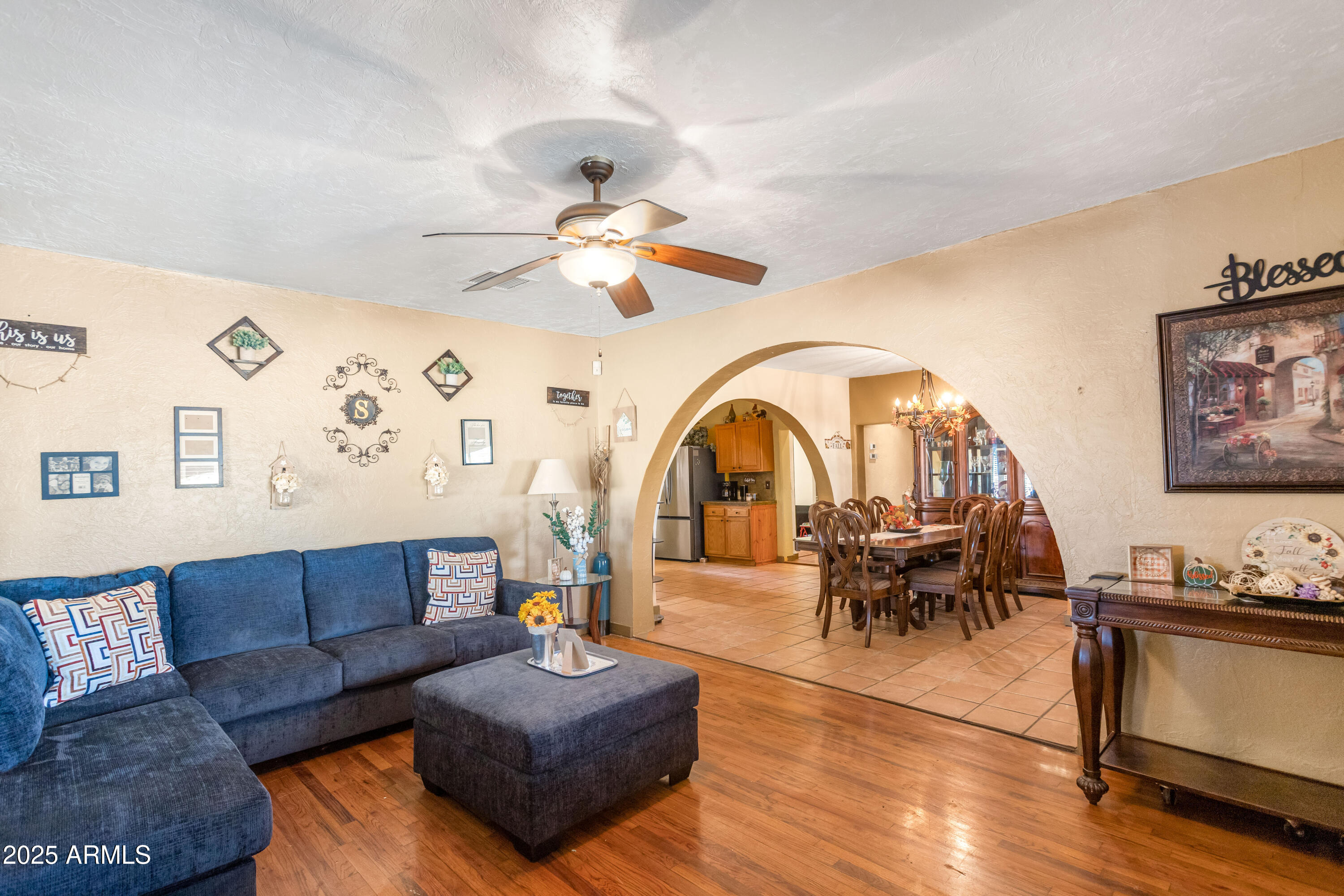 4181 West Double Adobe Road McNeal, AZ 85617 - Photo 8 of 41 a living room with furniture dining table and a chandelier