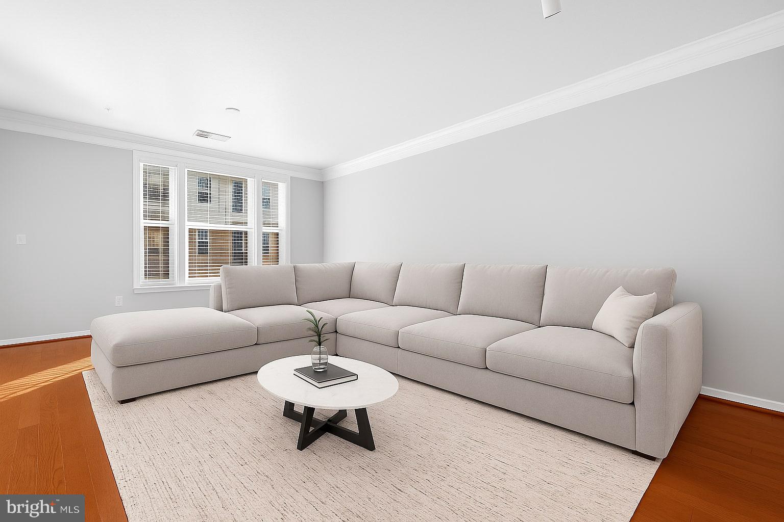 7 Granite Place, Unit 215 Gaithersburg, MD 20878 - Photo 7 of 36 a living room with furniture and a window