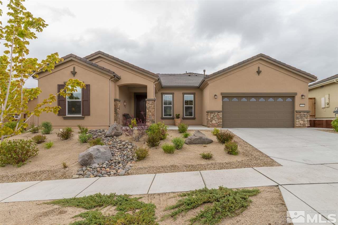 1255 Wakefield Trail Reno, NV 89523 - Photo 1 of 25 a front view of a house with garden
