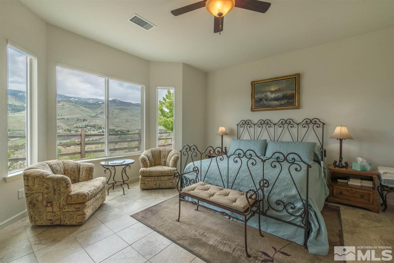 1255 Wakefield Trail Reno, NV 89523 - Photo 15 of 25 a bedroom with furniture and a large window