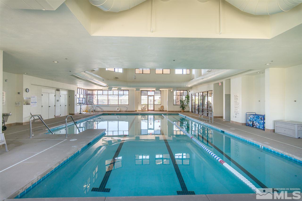 1255 Wakefield Trail Reno, NV 89523 - Photo 24 of 25 a view of a swimming pool and lounge chair