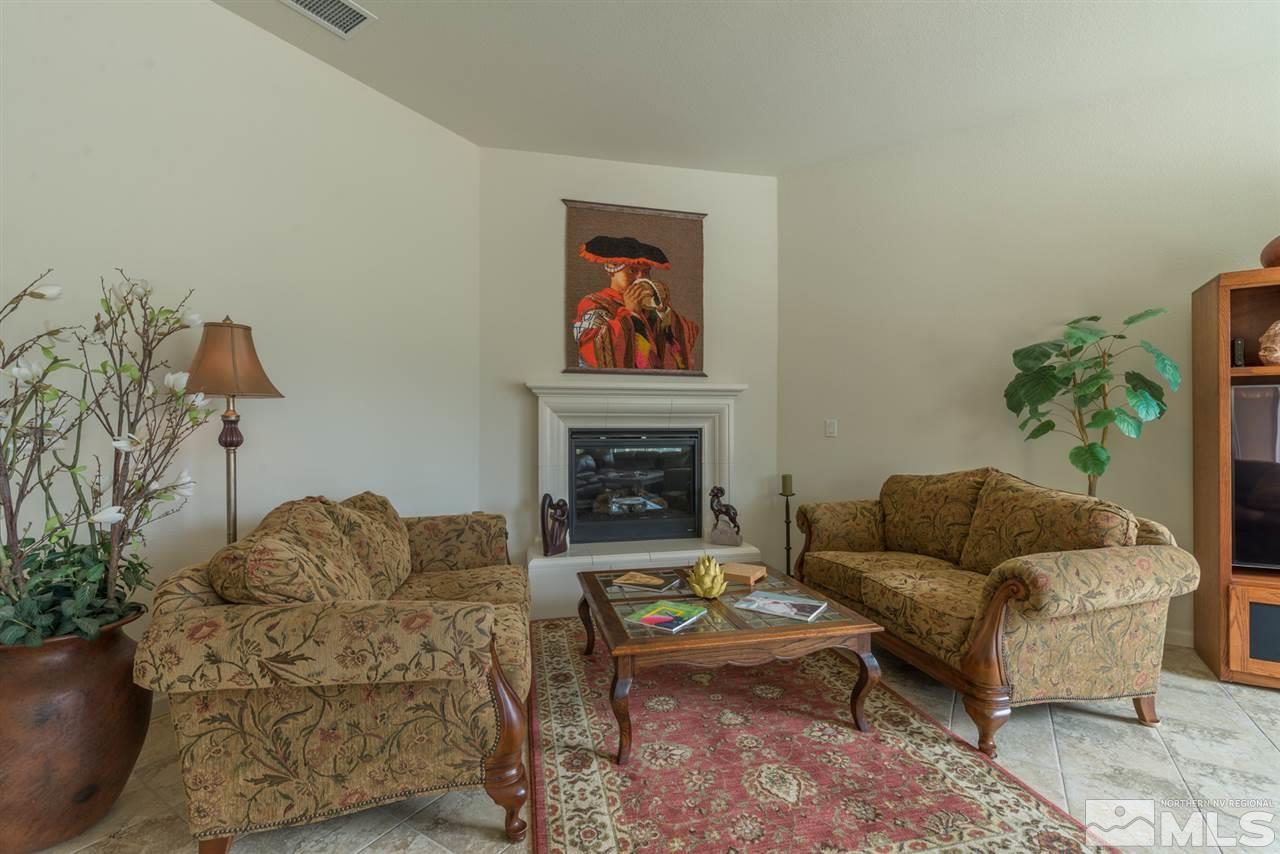 1255 Wakefield Trail Reno, NV 89523 - Photo 7 of 25 a living room with furniture and a fireplace
