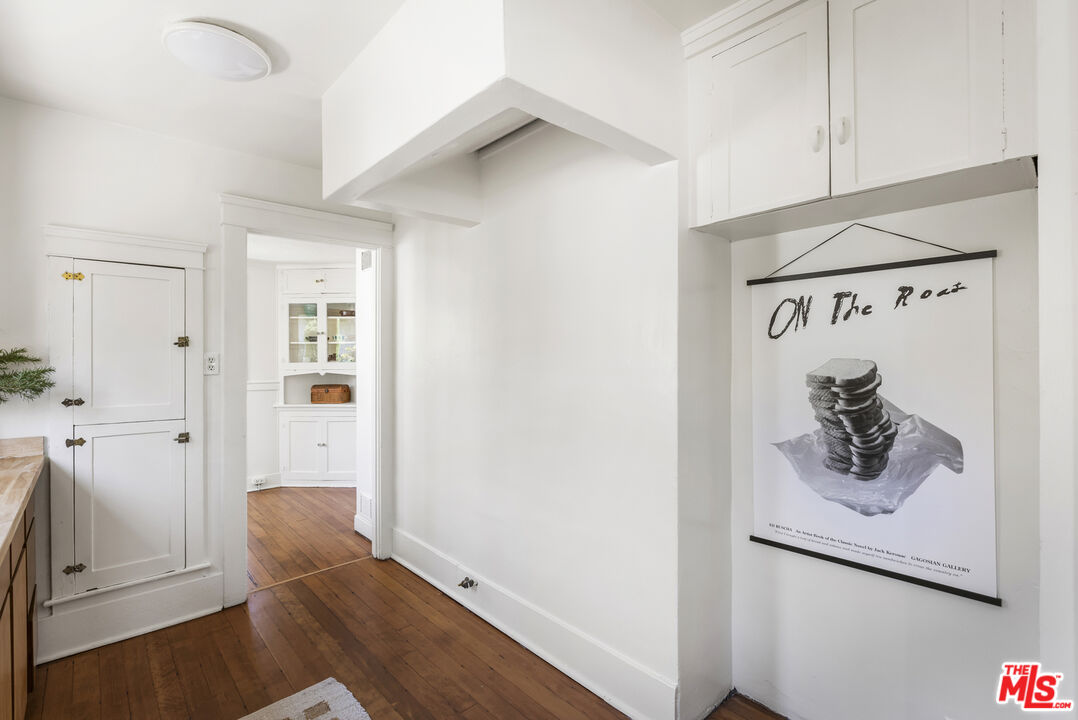 3865 Brunswick Avenue Los Angeles, CA 90039 - Photo 14 of 44 a view of a hallway to rooms and wooden floor