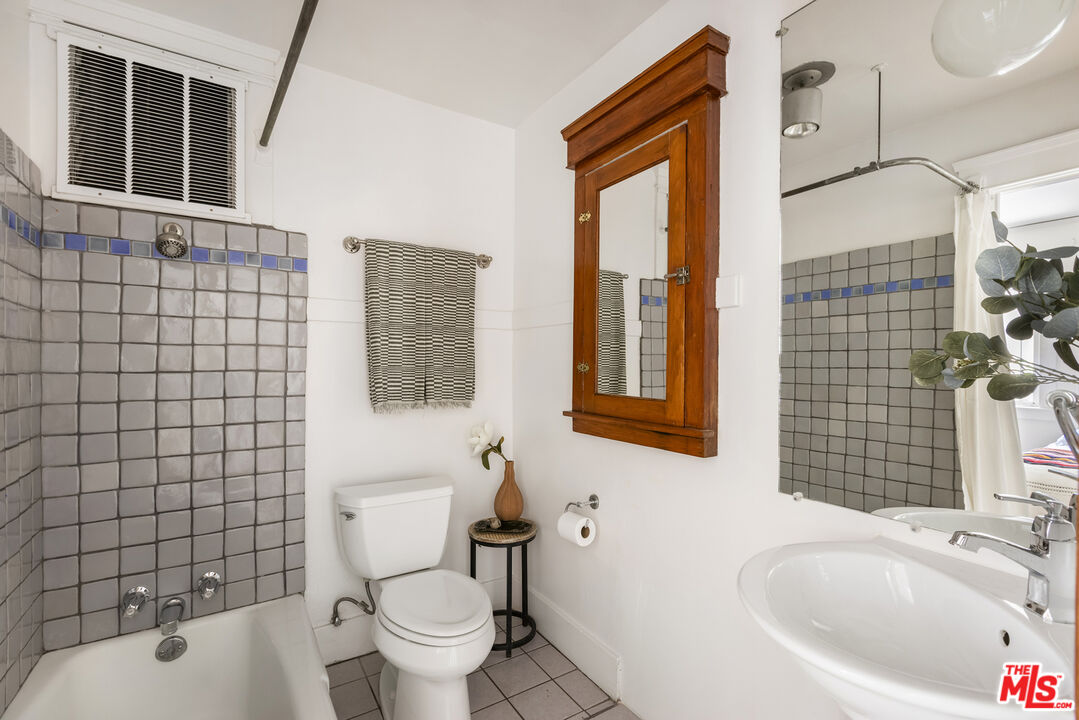 3865 Brunswick Avenue Los Angeles, CA 90039 - Photo 22 of 44 a bathroom with a sink toilet and shower