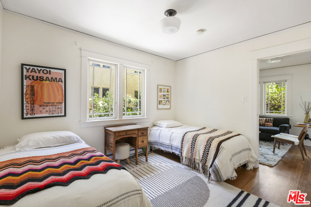 3865 Brunswick Avenue Los Angeles, CA 90039 - Photo 24 of 44 a bedroom with two beds and a large window