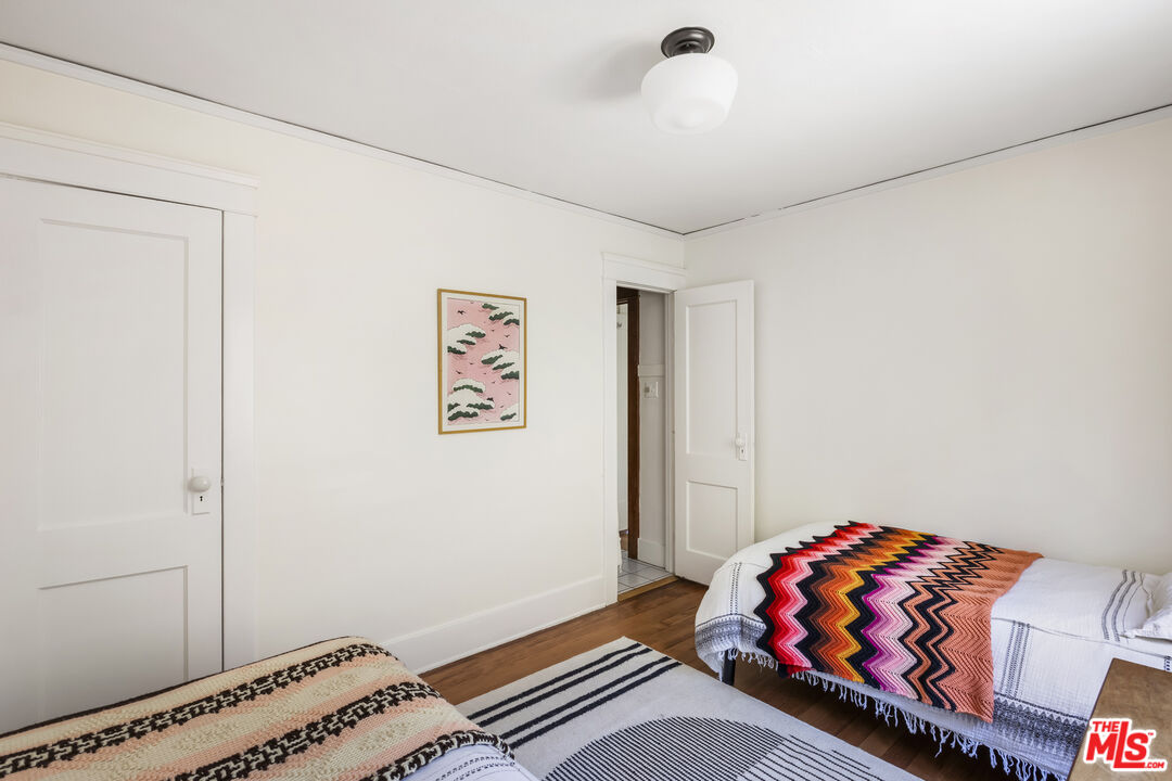 3865 Brunswick Avenue Los Angeles, CA 90039 - Photo 25 of 44 a bedroom with bed and a window