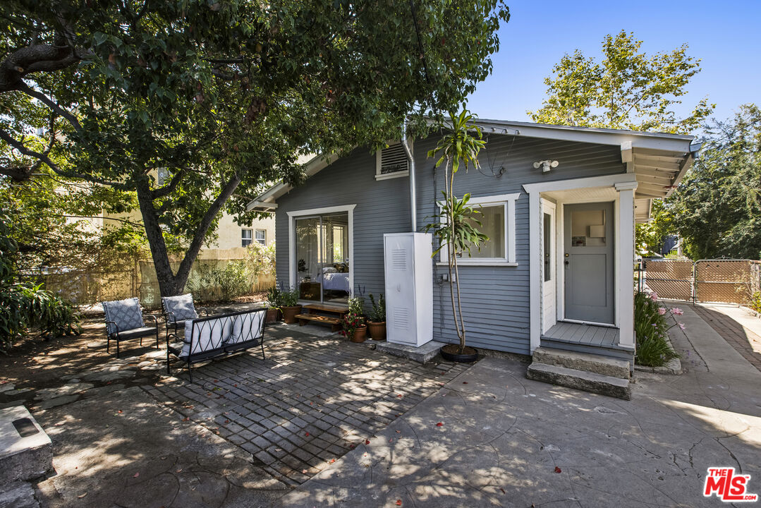 3865 Brunswick Avenue Los Angeles, CA 90039 - Photo 26 of 44 a front view of a house with garden