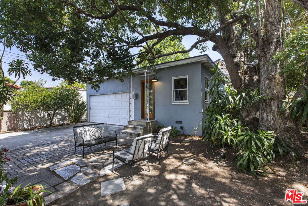 3865 Brunswick Avenue Los Angeles, CA 90039 - Photo 27 of 44 a view of backyard with outdoor seating and trees